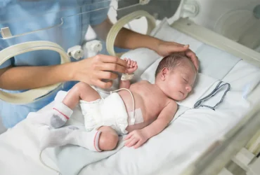 baby being cared for in the NICU